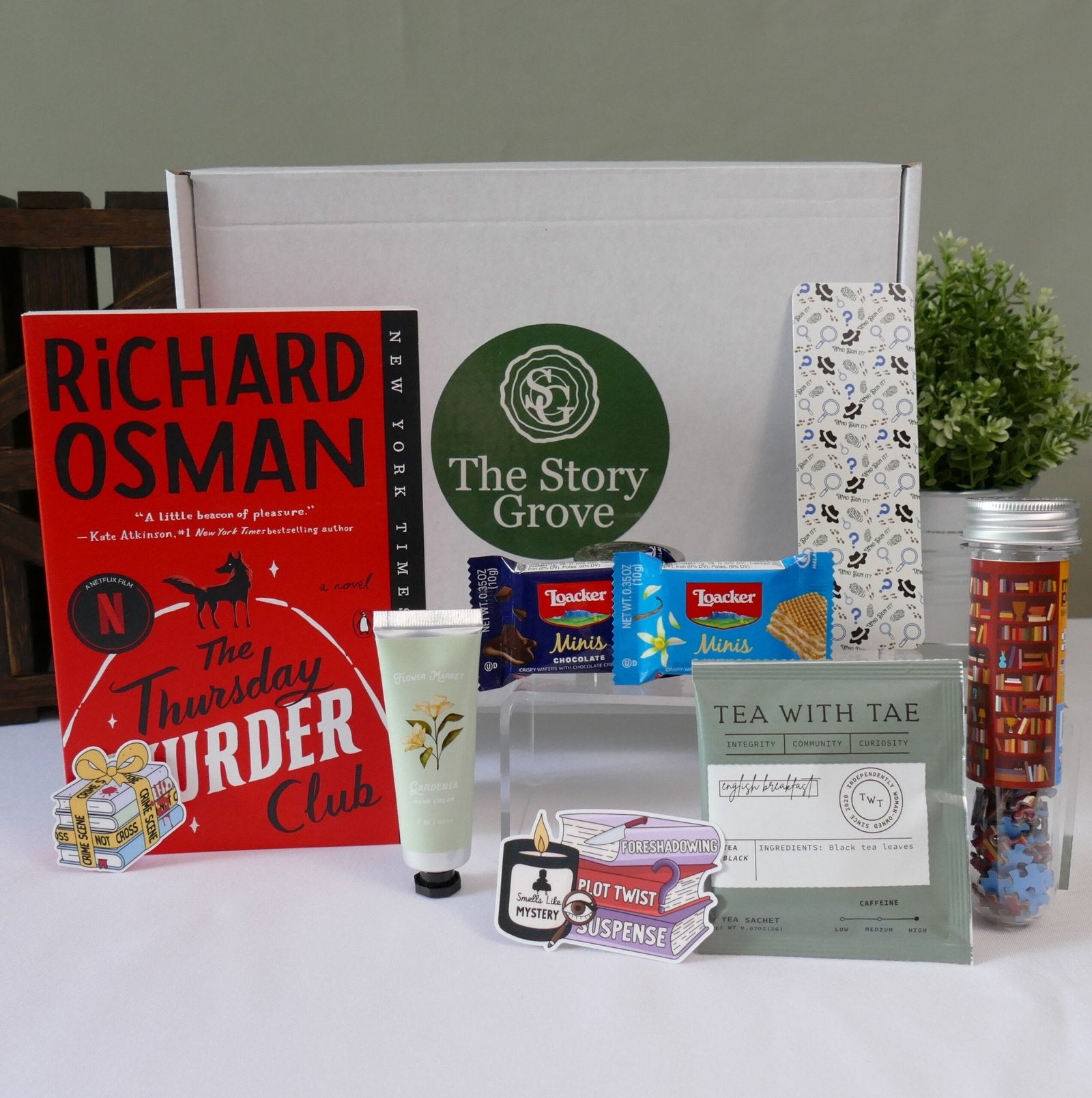 Thursday Murder Club premium story box – flat lay of included items