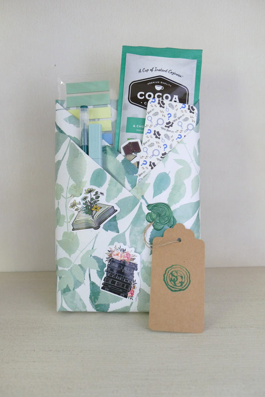 Surprise wrapped book with green leaf design – fantasy and sci-fi | The Story Grove
