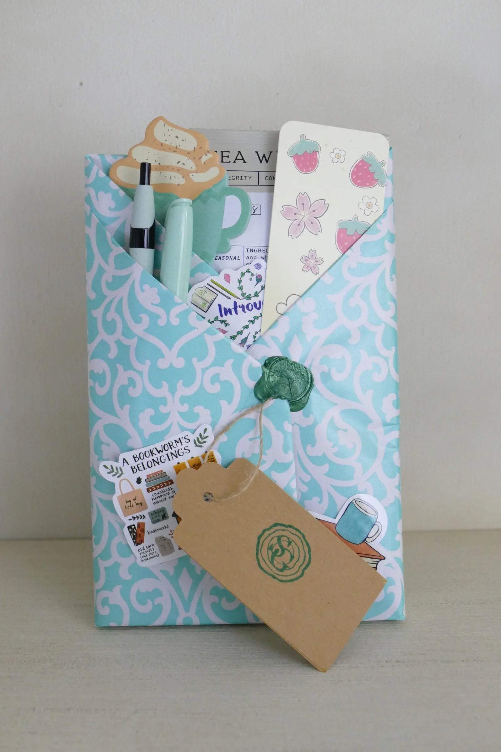Surprise wrapped book in teal ornate wrapping – YA contemporary | The Story Grove